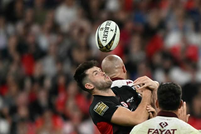 Toulouse's Blair Kinghorn in an aerial joust during the Top 14 final match against Bordeaux-Begles in Paris.