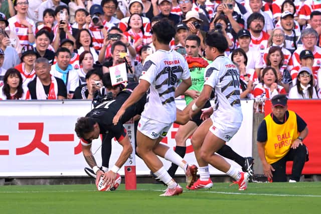 Cole Forbes of Maori All Blacks scores the team's first try during the win over Japan in Tokyo.