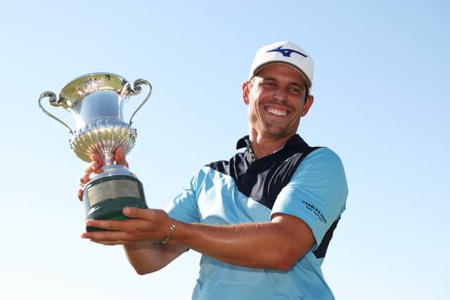 Frenchman Adrien Saddier shows off the trophy after winning the Italian Open