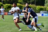 England's Tyler Offiah on the attack against Scotland during the World Rugby U20 Championship Pool A match at Payanini Center in Verona.