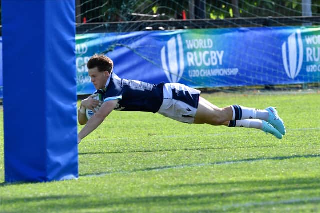 Hector Patterson dives over to score a try for Scotland against England in the World Rugby U20 Championship in Verona.