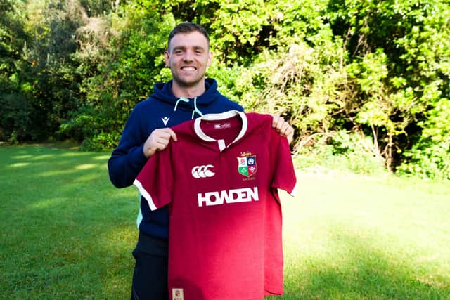 Ben White poses with a Lions jersey just before leaving the Scotland camp and flying to Australia.