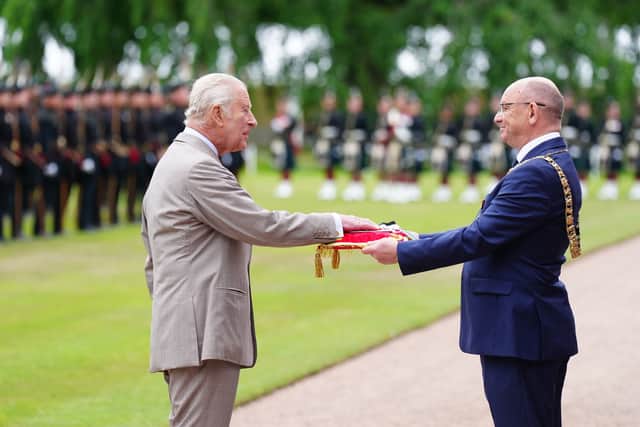 The Lord Provost of Edinburgh Robert Aldridge (right) presents the keys to the City of Edinburgh to King Charles III during the Ceremony of the Keys in the gardens of the Palace of Holyroodhouse in Edinburgh. Picture: Jane Barlow/PA Wire