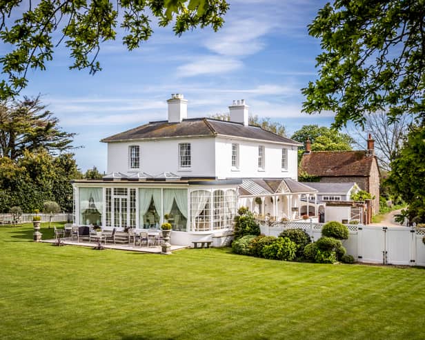 The £3 million house sits in 1.34 acres of private, manicured gardens