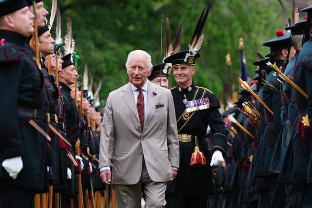 King Charles III inspects the Guard of Honour from the Royal Company of Archers, the King's Bodyguard Scotland at the Ceremony of the Keys in the gardens of the Palace of Holyroodhouse in Edinburgh. Picture: Jane Barlow/PA Wire