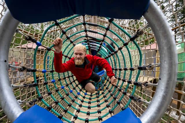 Staff members test out the 'Adventure Nets' at Center Parcs in Longleat Forest, Wiltshire (Picture: Ben Birchall)