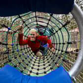 Staff members test out the 'Adventure Nets' at Center Parcs in Longleat Forest, Wiltshire (Picture:  Ben Birchall)