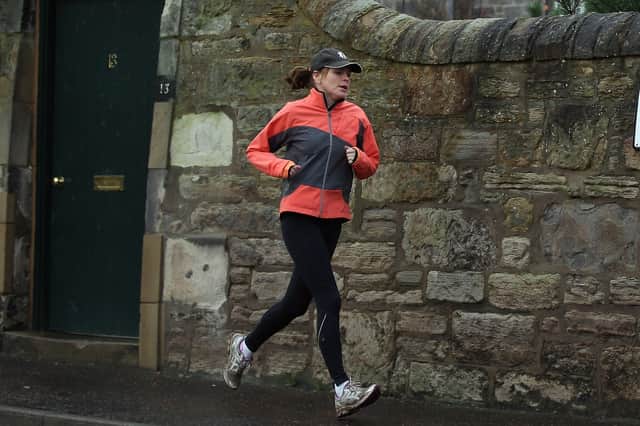 Going for a regular jog or walk can have a significant effect on both our health and happiness (Picture: Jeff J Mitchell)