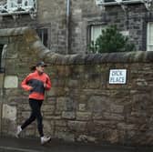 Going for a regular jog or walk can have a significant effect on both our health and happiness (Picture: Jeff J Mitchell)