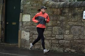 Going for a regular jog or walk can have a significant effect on both our health and happiness (Picture: Jeff J Mitchell)