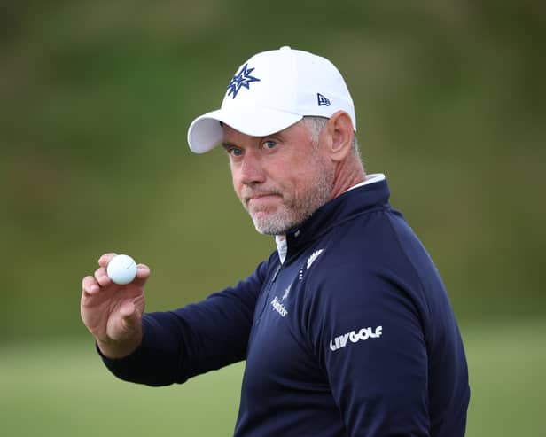 Lee Westwood acknowledges the crowd on the 18th green following his second round in The Open Final Qualifier at Dundonald Links in Ayrshire 
