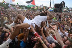 Bobby Vylan crowdsurfs during the Glastonbury festival where he led the crowd in a chant of 'death, death to the IDF' (Picture: Leon Neal)