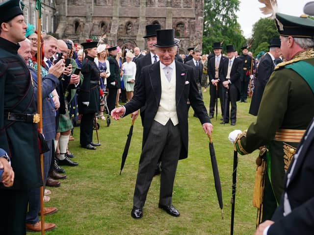 King Charles III during the Sovereign's Garden Party at the Palace of Holyroodhouse in Edinburgh.