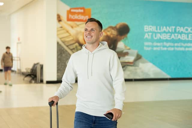 Lawrence Shankland is pictured at Glasgow Airport as talks with Hearts over a new contract continue. (Photo by Craig Foy / SNS Group)