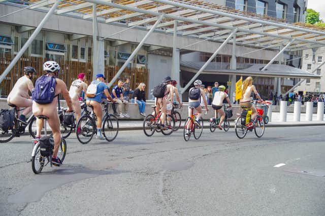 Cyclists pedal from The Meadows through Edinburgh's Old Town and passed the Scottish Parliament