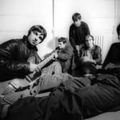 Some familiar faces join some not so familiar names as Oasis' live band have been revealed ahead of their first show in Cardiff this week.