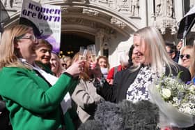 Members of For Women Scotland celebrate the Supreme Court ruling that the word 'woman' the 2010 Equality Act refers to a biological woman (Picture: Lucy North)