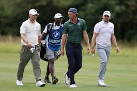 Two-time major winner Martin Kaymer, who now plays on the LIV Golf League, talks with fellow German Marcel Siem on day two of the BMW International Open at Golfclub Munchen Eichenried 