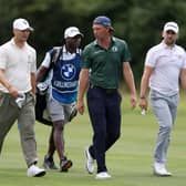 Two-time major winner Martin Kaymer, who now plays on the LIV Golf League, talks with fellow German Marcel Siem on day two of the BMW International Open at Golfclub Munchen Eichenried 