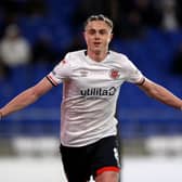 Rangers have completed the signing of Luton midfielder Thelo Aasgaard.