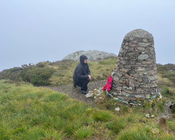 Joel Hornby, whose father Major Anthony Hornby was one of the victims of the RAF 1994 Chinook helicopter crash on June 2 1994 on the Mull of Kintyre, during a visit to the memorial cairn