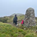 Joel Hornby, whose father Major Anthony Hornby was one of the victims of the RAF 1994 Chinook helicopter crash on June 2 1994 on the Mull of Kintyre, during a visit to the memorial cairn