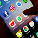 An initiative which aims to cut the risk of harm and death among drug users by giving them digital devices has secured funding to continue its work