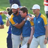 Bob MacIntyre is congratulated by Jon Rahm after winning his singles in the 2023 Ryder Cup in Rome