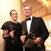 Christopher Nolan and Emma Thomas backstage after an award-filled night at the Oscars last year (Picture:  Al Seib/Ampas)