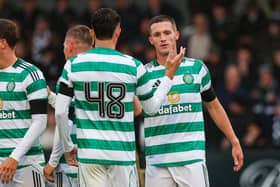 Celtic's Johnny Kenny (R) celebrates scoring to make it 1-0 with teammate Jude Bonnar during a pre-season friendly match between Queen's Park and Celtic at the City Stadium on Friday. Cr: SNS Group.