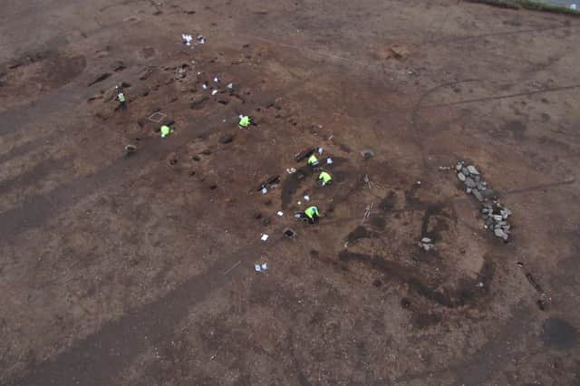Archaeologists at the Carnoustie site of the Neolithic timber hall. PIC: GUARD.