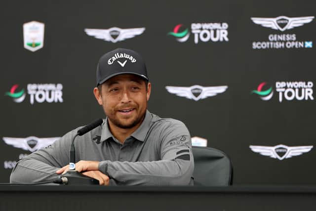 Xander Schauffele talks to the media during a press conference prior to the Genesis Scottish Open The Renaissance Club