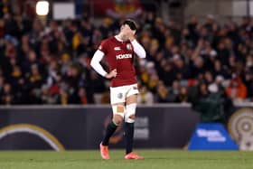 Blair Kinghorn can't hide his dejection after picking up an injury while playing for the Lions.