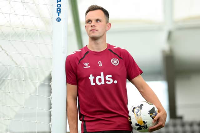 Lawrence Shankland will wear the Hearts captain's armband.