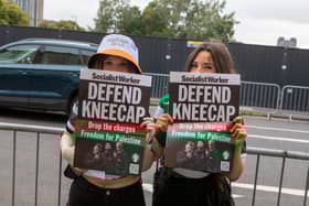 Fans hold ‘Defend Kneecap’ posters outside the Kneecap gig at the O2 Academy in Glasgow.