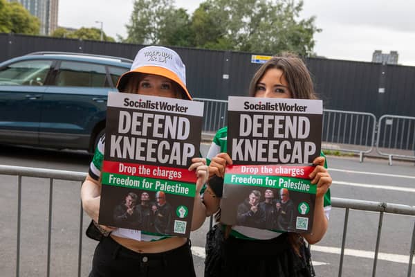 Fans hold ‘Defend Kneecap’ posters outside the Kneecap gig at the O2 Academy in Glasgow.
