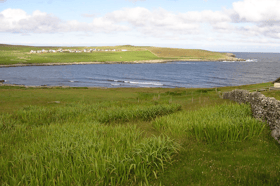 The excavation of a 'probable' Viking boat burial was carried out by Time Team at a site in Dunrossnesss (pictured) on the south of the Shetland mainland. PIC: geograph.org/Robbie.