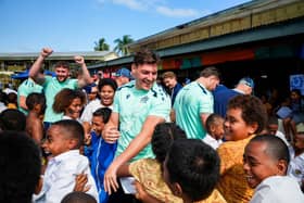 Tom Jordan during a visit by the Scotland squad to Nabua Primary School in Fiji.