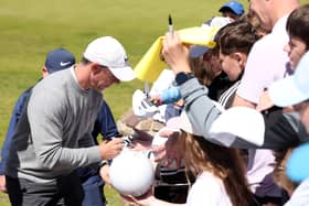 Grand slam winner Rory McIlroy signs autographs for fans during the pro-am prior to the Genesis Scottish Open at The Renaissance Club 
