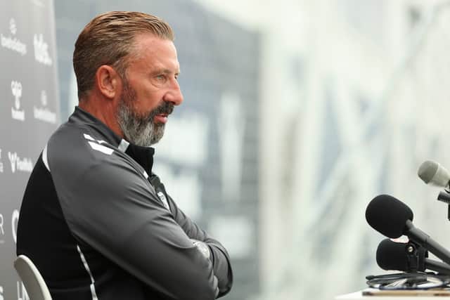 Derek McInnes makes his Hearts bow on Saturday.
