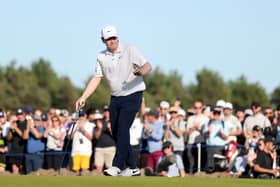 Bob MacIntyre  acknowledges the crowd on the 18th green on day two of the Genesis Scottish Open at The Renaissance Club 