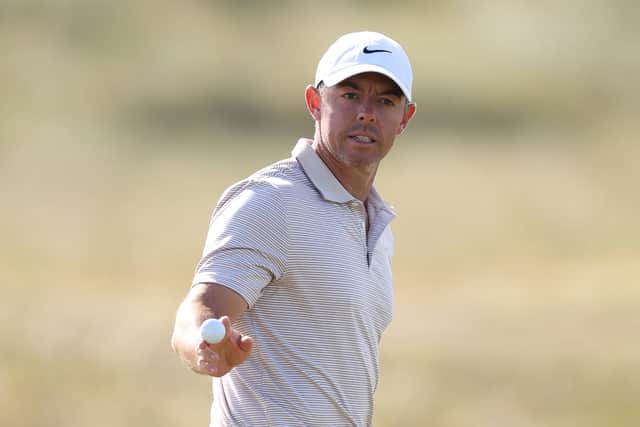 Rory McIlroy acknowledges the crowd on the 12th green on day three of the Genesis Scottish Open at The Renaissance Club