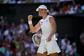  Iga Swiatek is hoping to lift the Wimbledon trophy today.