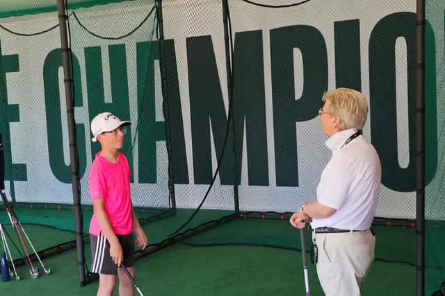 East Lothian legend Jane Connachan, one of the Stephen Gallacher Foundation coaches, gives a lesson in the Genesis Scottish Open Fan Zone at The Renaissance Club