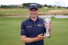 David Law shows off the trophy after winning the D+D REAL Czech Challenge at Royal Beroun Golf Club in Beroun, Czech Republic 