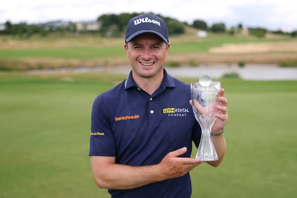 David Law shows off the trophy after winning the D+D REAL Czech Challenge at Royal Beroun Golf Club in Beroun, Czech Republic 