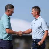 Justin Rose shakes hands with Grant Forrest on the 18th green on day four of the Genesis Scottish Open  at The Renaissance Club 