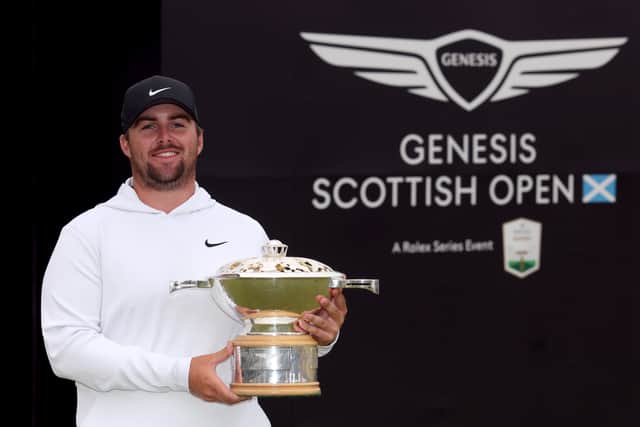American Chris Gotterup shows off the trophy after winning the Genesis Scottish Open at The Renaissance Club