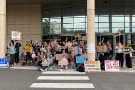Parents and children gathered in Victoria Quay this morning to protest against the closure of the building's nursery