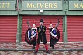 MC Puppet Paul and Can Can dancers, Amy Espie and Amber Dollin ahead of the Moulin Rouge event at the Barras Market.